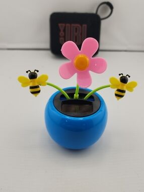 Solar Dancing Pink Flower with Bees in Blue Pot